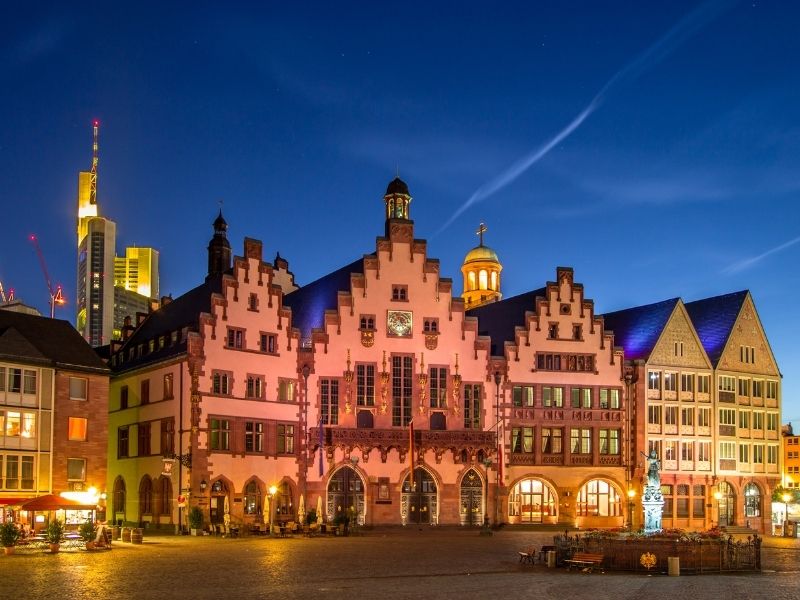 Historical buildings lit up at night