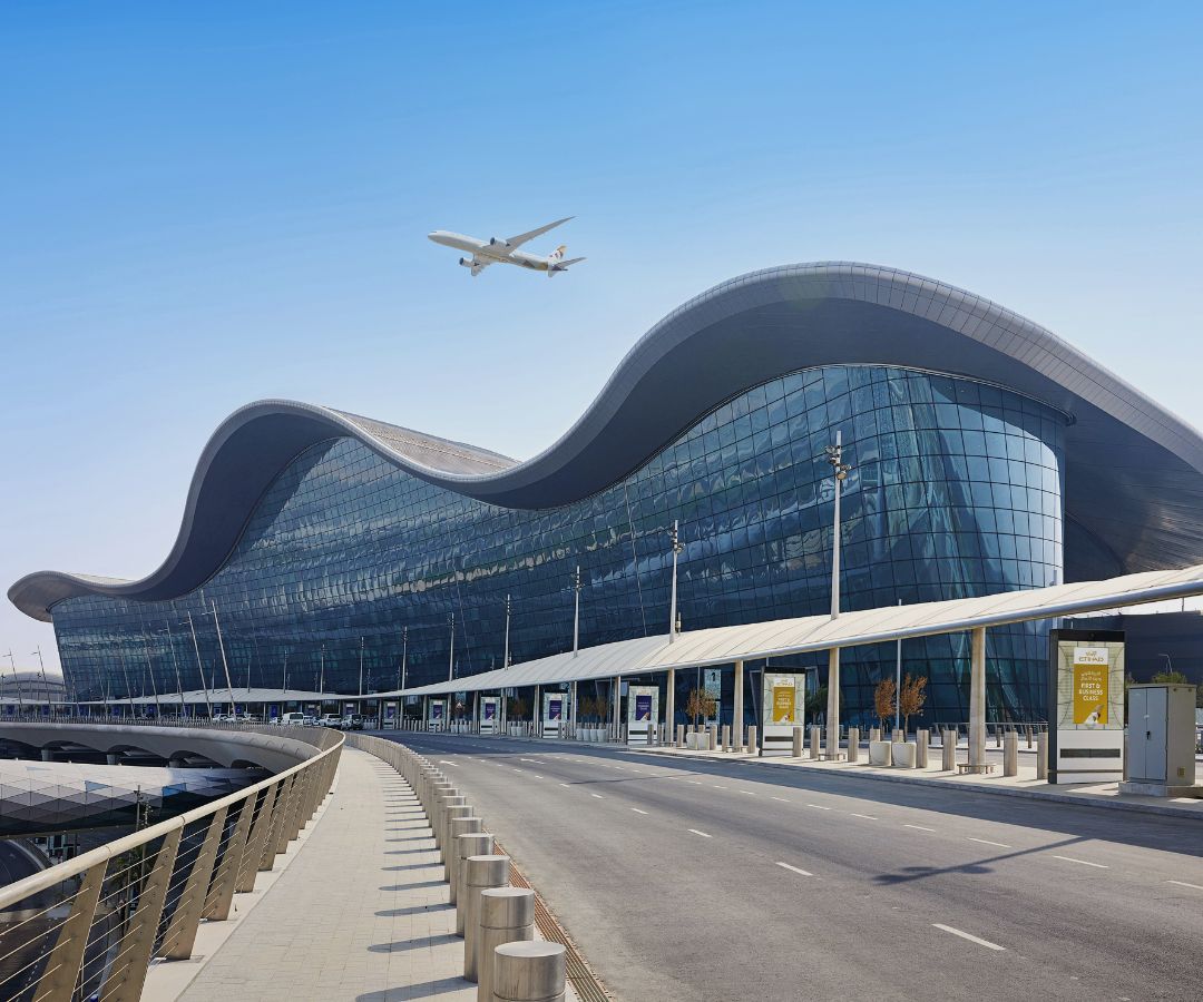 Etihad plane over airport