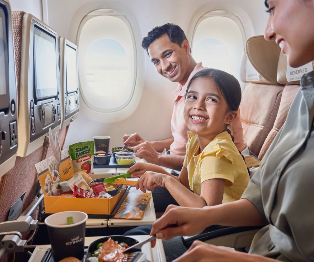 Happy family in plane