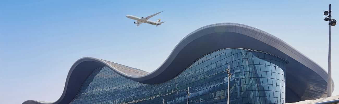 Etihad plane over airport