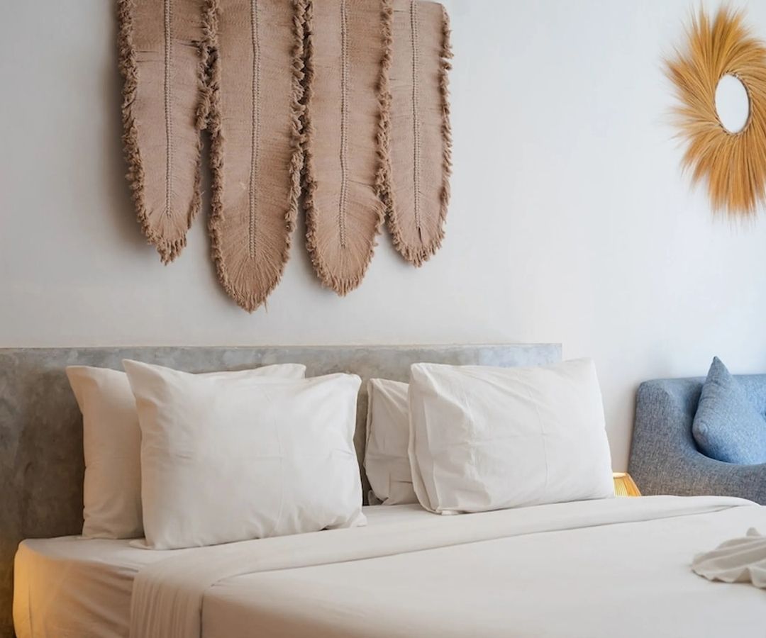 Neatly made bed in hotel