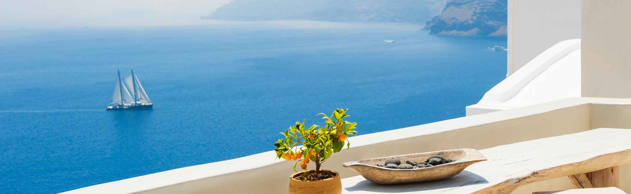 Mediterranean coast with yacht sailing