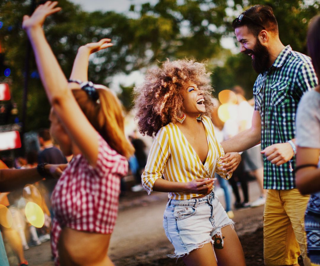 Happy friends dancing