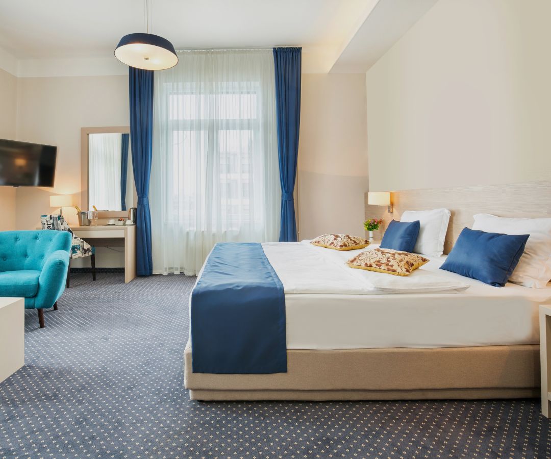 Smart hotel room with blue pillows