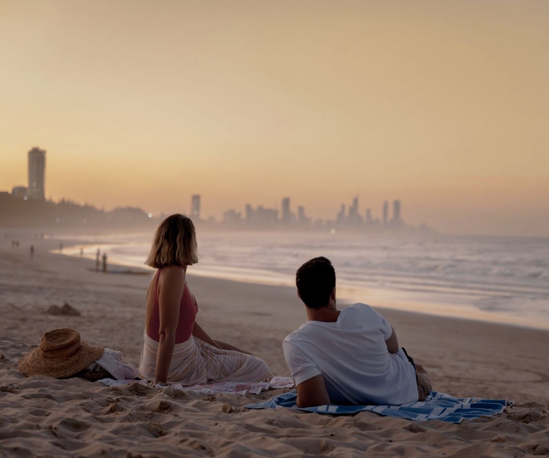 Couple sitting at beach