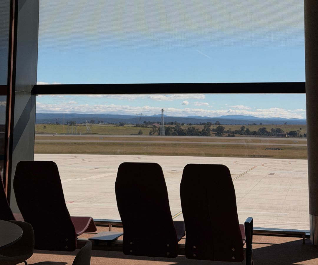departure waiting area overlooking runway