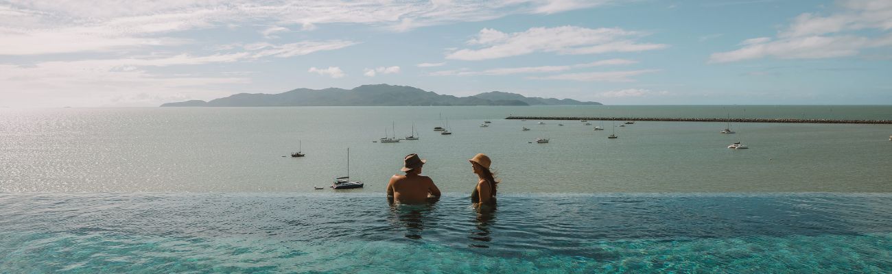 Couple in infinity pool