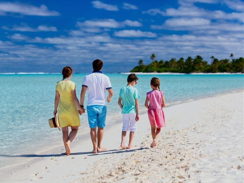 family walking on beach