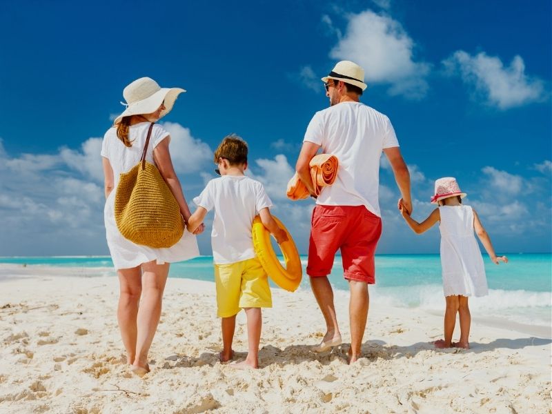 family walking on beach