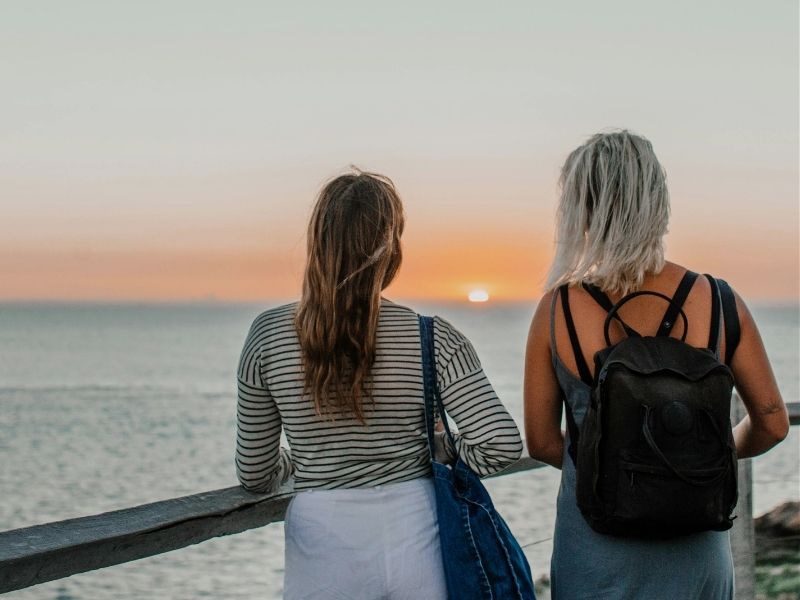 friends looking out at ocean