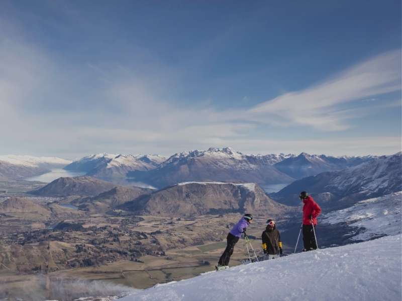 skiers on a snowy mountains
