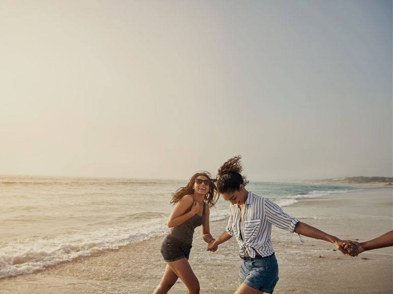 friend running on beach