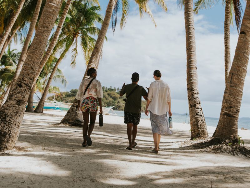 friends walking on beach