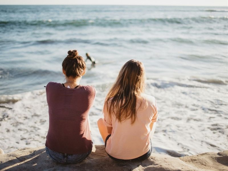 friends watching waves