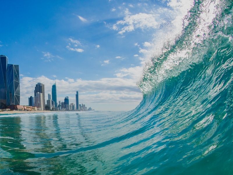 gold coast skyline and waves