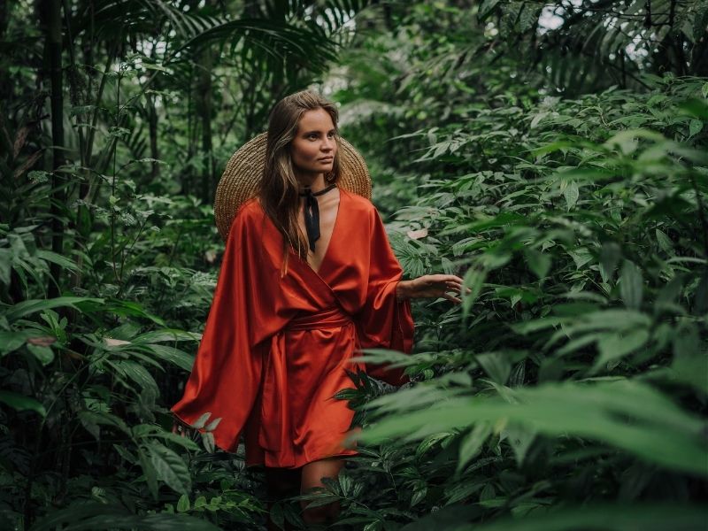 lady walking through jungle