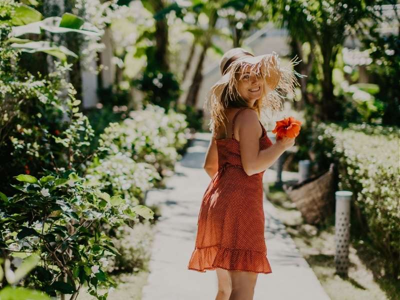 lady walking through gardens