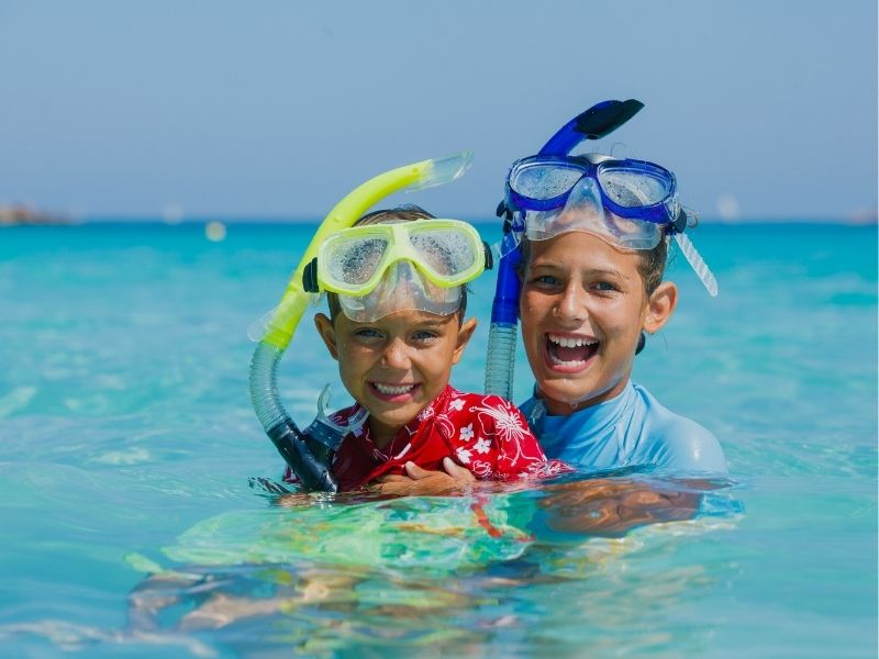 brother snorkelling in ocean