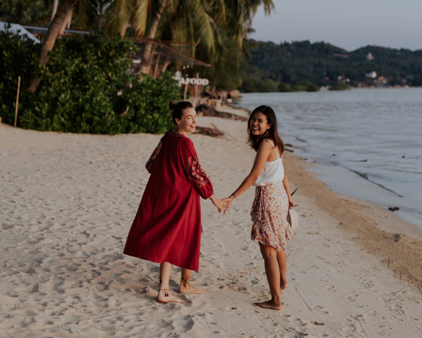 friends walking on beach