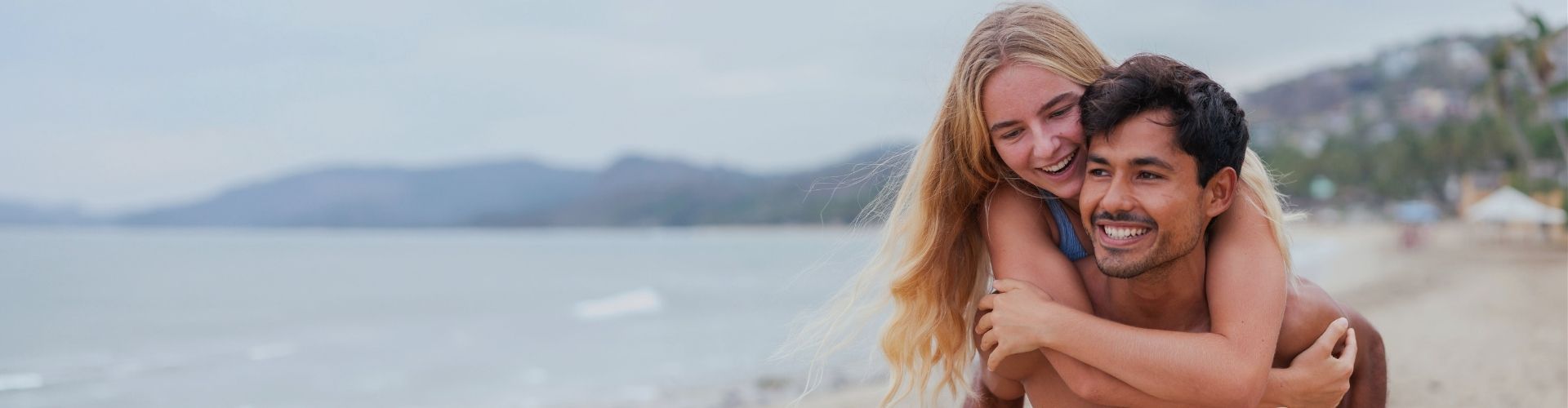 couple smiling on beach